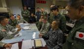 Planners from the U.S. military and Japan Self-Defense Forces discuss missile defense in a February exercise. (USAF)