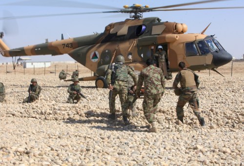 Afghan National Army soldiers learn to medevac casualties at Camp Shorabak in Helmand Province on Feb. 19, 2014. For many, this was the first time they had been aboard a helicopter. (U.S. Marine Corps)